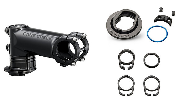 Vorbau für Fahrräder und Steuerlager auf einer weissen Fläche.