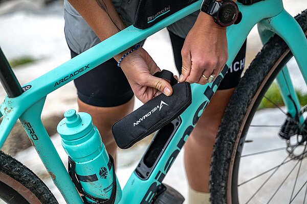 Bianchi Arcadex Bikepacking Gravelbike. Ein mint grünes Fahrrad von Bianchi.